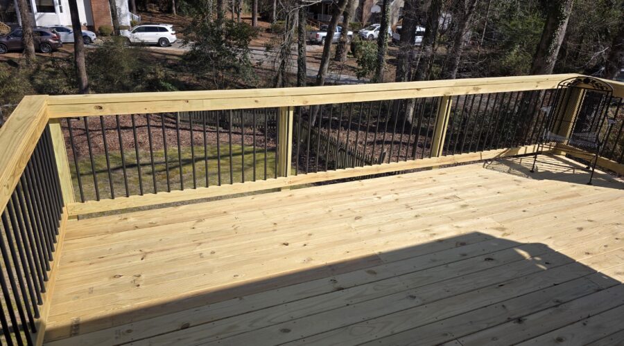 Aluminum deck balusters with 2x6 cocktail rail