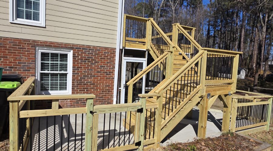 Wood deck staircase with intermediate landing