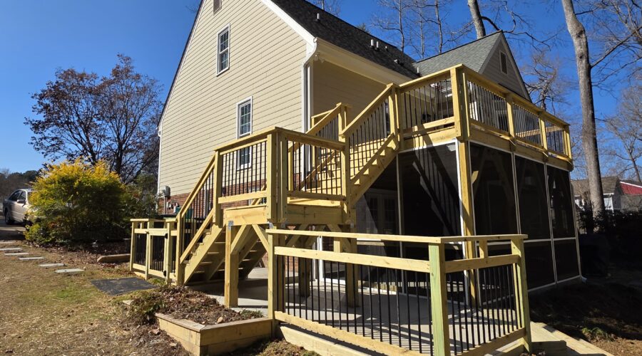 Dry screened porch beneath second-story deck