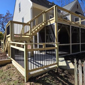 Second-story pine deck with Trex RainEscape and screened porch in Knightdale, NC